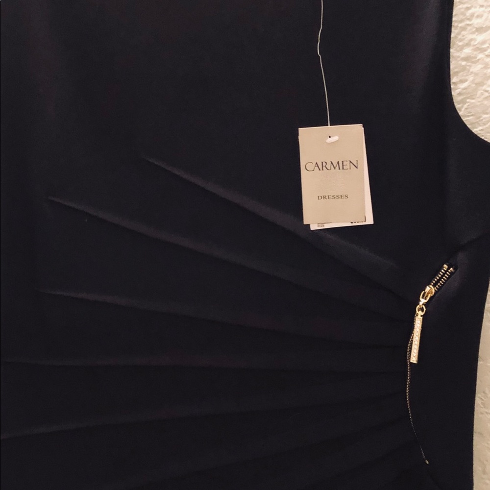 Black Carmen dress with gold false zip detail.